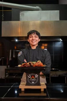 professional chef in mexican restaurant kitchen